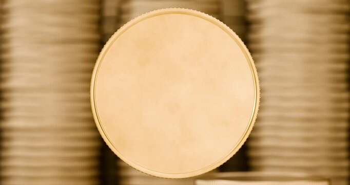 Empty gold coin spinning animation. Gold coin template with stacked coins background for your logo or design. Gold coin animation appearing from bottom of screen. Heads or tails.