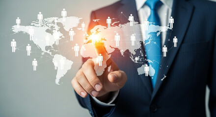 Businessman pointing at world map with human icons representing global network connections concept