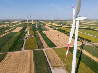 Wind turbine installation using a large construction crane. The assembly process of the turbine...