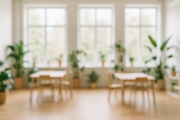 A bright and airy office environment with expansive windows, abundant sunlight, and greenery, ideal for creative teamwork in a contemporary studio