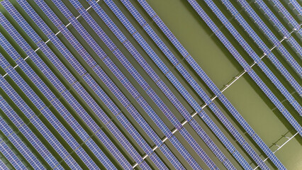 Aerial View of Solar Panels Array on Water Surface