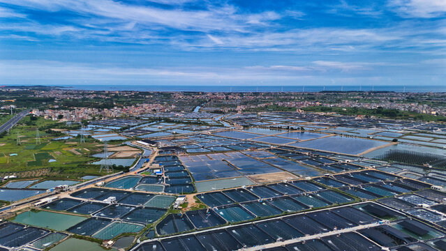 Aerial View of Modern Aquaculture Farms - Powered by Adobe