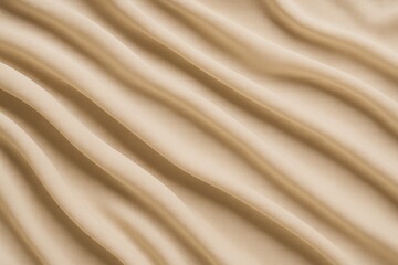 Obraz premium Flowing beige textile with wave patterns