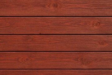 Obraz premium A set of interconnected red wooden planks arranged horizontally for stability