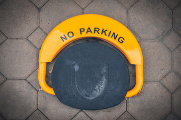 Parking barrier with folded position