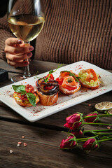 various appetizers with meat and cheese