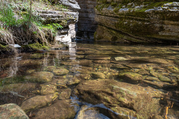 Mountain river in the forest. A beautiful view of Rosomacki Lonci in Slavinja, Serbia. Canyon of...