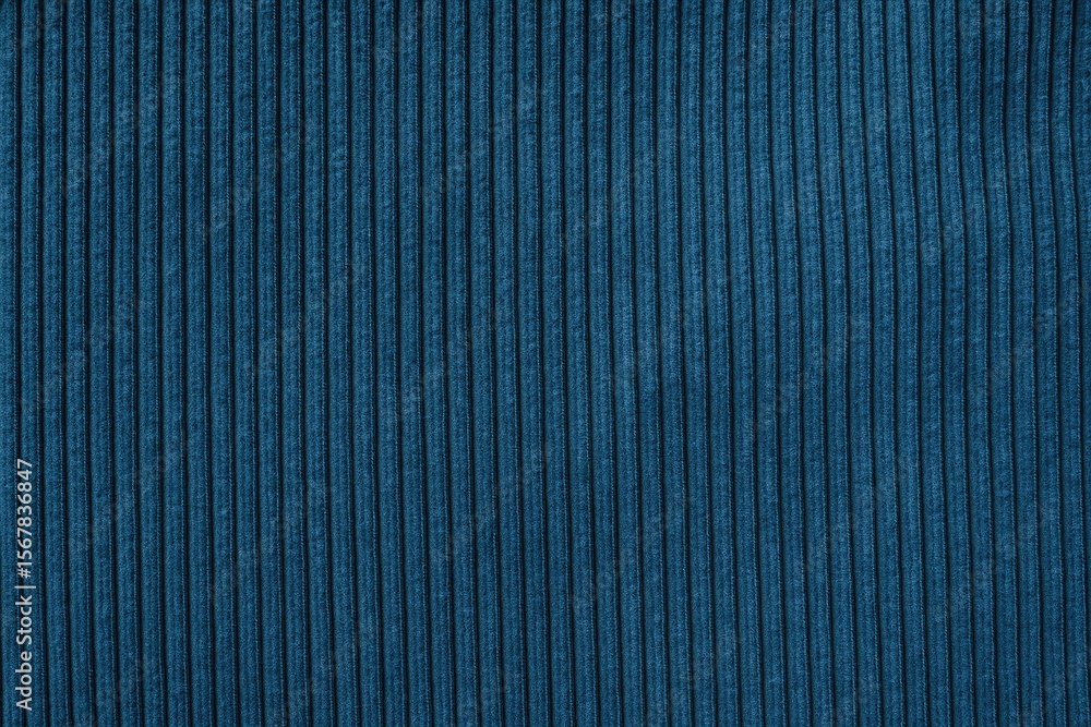 Poster detailed view of a blue textured fabric with a corduroy pattern for design use