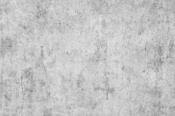 Fototapeta premium Detailed close-up of a textured concrete surface showcasing diverse elements and variations