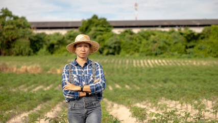 Farmer Standing Confidently in Lush Green Field