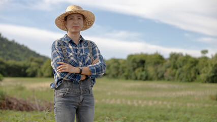 Farmer Standing Confidently in Lush Green Fields