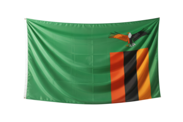 Waving Zambia flag features green background, flying African fish eagle and symbolic stripes in orange and black against a transparent background
