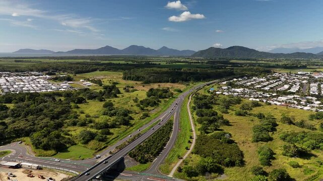 Smithfield, Cairns, Queensland, Australia 4K Aerial Footage Showing Highway, Smithfield Bypass, Road Infrastructure, Residential Suburbs, Construction Zone, Farmland, and Mountain Ranges in Tropical
