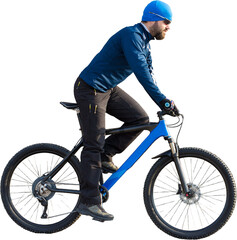 Naklejka premium A guy in sportswear riding clothes on a modern mountain carbon bike with an air suspension fork at a vintage brick concrete wall.
