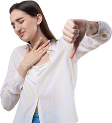 Young brunette in a blue tank top giving thumb down gesture looking with negative expression