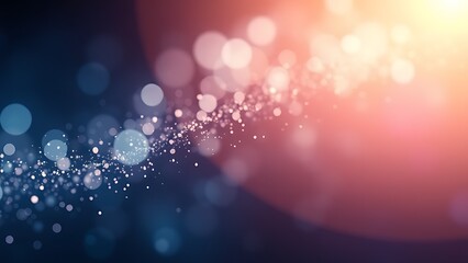 Abstract shimmering light particles with gradient colors and soft glowing bokeh, creating an atmospheric effect.