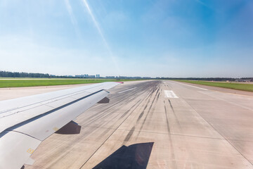 View from the airplane window during takeoff at Sheremetyevo airport at summer