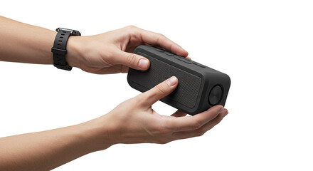Fototapeta premium Hands holding black wireless portable speaker isolated on a transparent background 