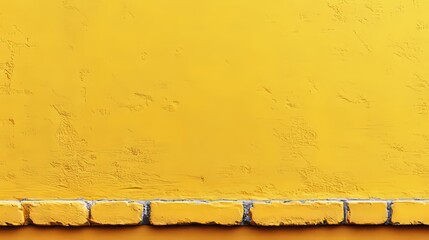 Golden Brick and Concrete Textured Wall: Close-up shot of a textured yellow wall, with a line of golden bricks at the base. Capturing simplicity and structure, evoking a sense of warmth and vibrancy.