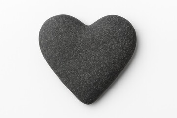 Fototapeta premium Gray stone resembling a heart on a white backdrop