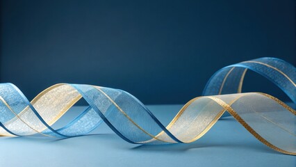 Elegant blue and gold ribbon gracefully curves across a deep blue background creating a sophisticated and luxurious visual