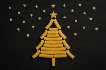 Festive pasta arrangement illuminated by a starry night sky backdrop