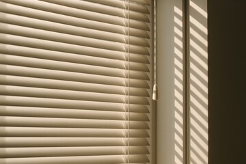 Sunlit window blinds creating a bright ambiance