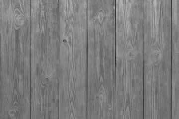 Fototapeta premium Gray wooden barn wall with textured paint and weathered stains