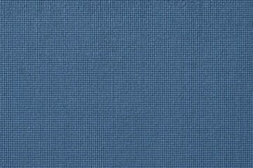 Looking down at a blue cotton fabric showcasing its texture