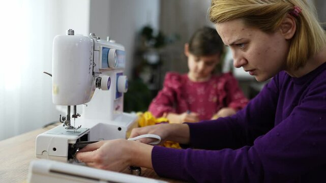 Creative crafting moments shared between a mother and daughter