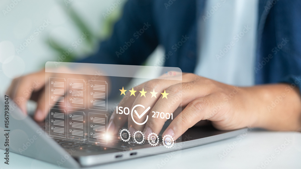 Poster close-up of hand using laptop with iso 27001 certification icon, document management system, audit c