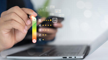 Close-up of hand selecting high customer satisfaction score with star rating bar and smiley face icons on digital interface, representing customer feedback and online reviews.