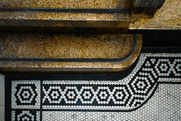 Curved Staircase and Black-and-White Mosaic Floor in Historic Shanghai Apartment Interior