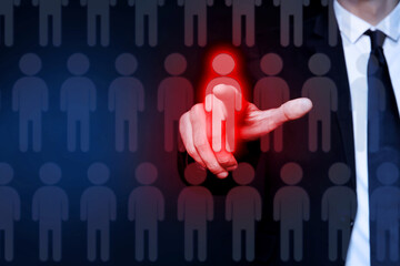 Dismissal. Businessman choosing human figure on virtual screen against dark blue background, closeup