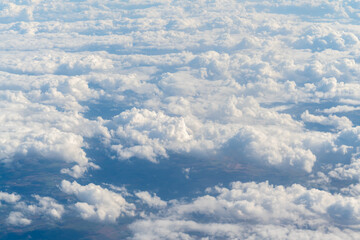 Clouds and blue sky, view from airplane