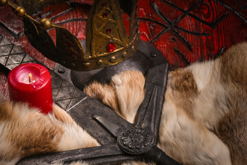 Old long medieval two handed knight warrior sword and viking wooden shield with ancient runes and...