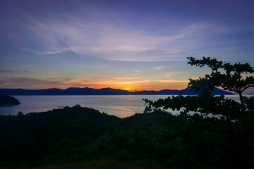 Naklejka premium Sunset over the lush landscape of Romblon islands. Romblon, Philippines