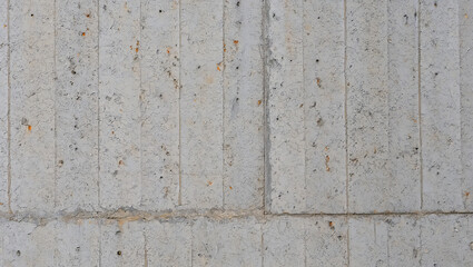 Weathered Concrete Wall Panels with Rust Stains and Natural Aging