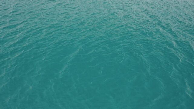 Slow motion closeup shot of ocean water surface