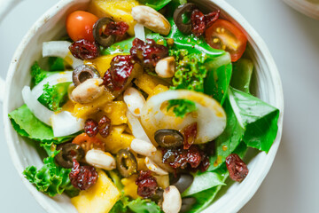 Delicious fruit salad and different fruits, healthy food concept