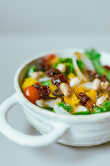 Delicious fruit salad and different fruits, healthy food concept