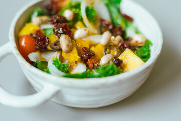 Delicious fruit salad and different fruits, healthy food concept