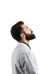 Obraz premium Young bearded man in a white lab coat looking up. Profile portrait of a doctor or scientist on a transparent background.