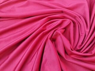 Abstrack red silk wavy fabric texture background 