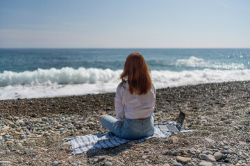 Beach Laptop Woman: Girl works on shore during day for freedom lifestyle, relaxed.
