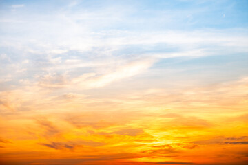 Beautiful , luxury soft gradient orange gold clouds and sunlight on the blue sky perfect for the background, take in evening,Twilight, Large size, high definition landscape photo