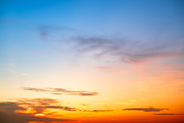 Beautiful , luxury soft gradient orange gold clouds and sunlight on the blue sky perfect for the background, take in evening,Twilight, Large size, high definition landscape photo