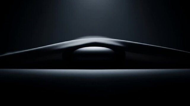 Mysterious reveal: Fabric lifts to unveil hidden object in a dark, cinematic presentation