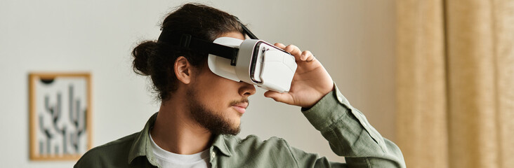 Engaging virtual reality experience at home with a young handsome man immersed in technology