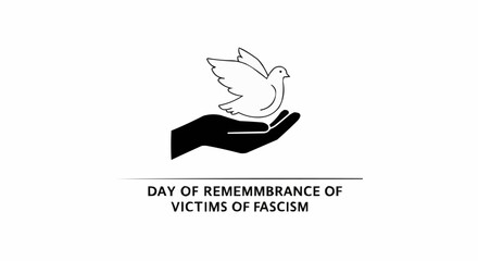 Fototapeta premium Dove of peace held gently in hand, with a text related to the victims of fascism.